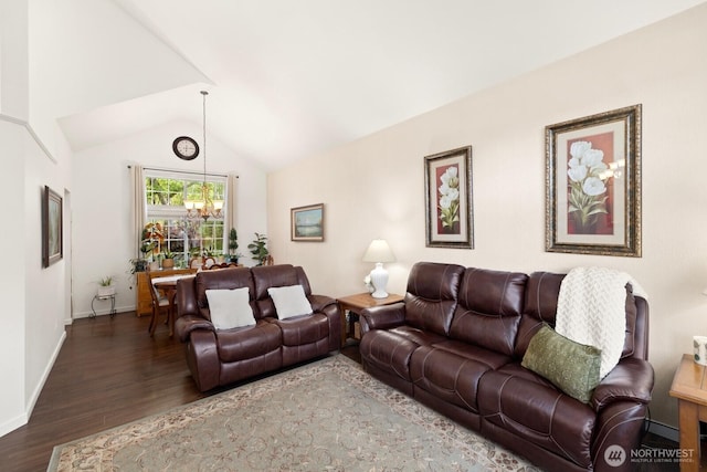 living area featuring baseboards, an inviting chandelier, wood finished floors, and lofted ceiling