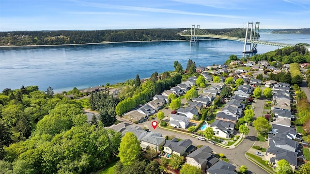 aerial view featuring a residential view and a water view