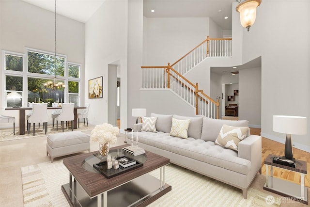 8210 N 9th St, Tacoma, WA 98406 - living area with a towering ceiling, stairs, a chandelier, and recessed lighting
