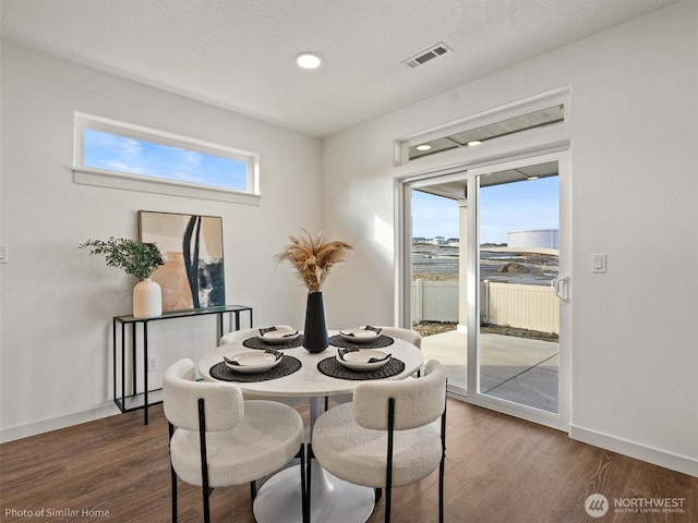 1349 Bill Ave, Walla Walla, WA 99362 - dining area featuring dark wood-style flooring, baseboards, and recessed lighting