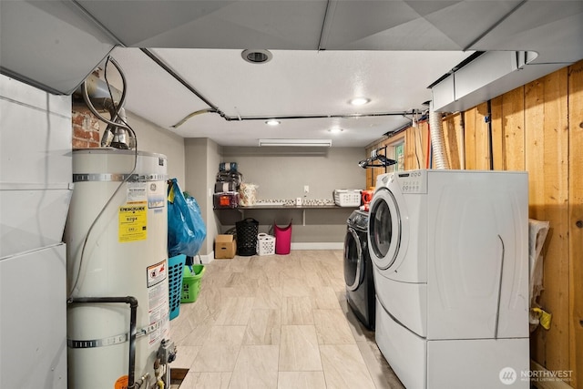505 S 8th, Shelton, WA 98584 - laundry room with strapped water heater and washing machine and clothes dryer
