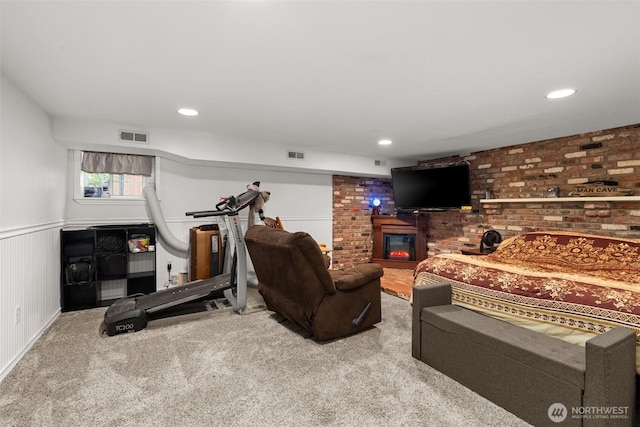 505 S 8th, Shelton, WA 98584 - living room featuring a glass covered fireplace, carpet flooring, a wainscoted wall, and recessed lighting