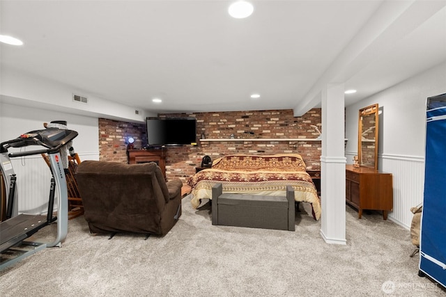505 S 8th, Shelton, WA 98584 - living room featuring carpet, wainscoting, recessed lighting, and brick wall