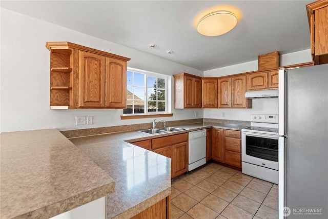 kitchen featuring open shelves, a sink, under cabinet range hood, white appliances, and light tile patterned flooring