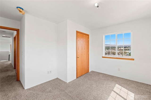empty room with carpet floors