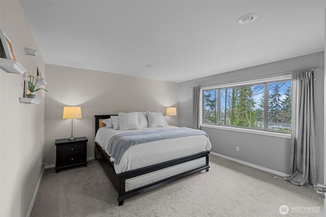 6211 116th Ave NE, Kirkland, WA 98033 - bedroom featuring light colored carpet and baseboards