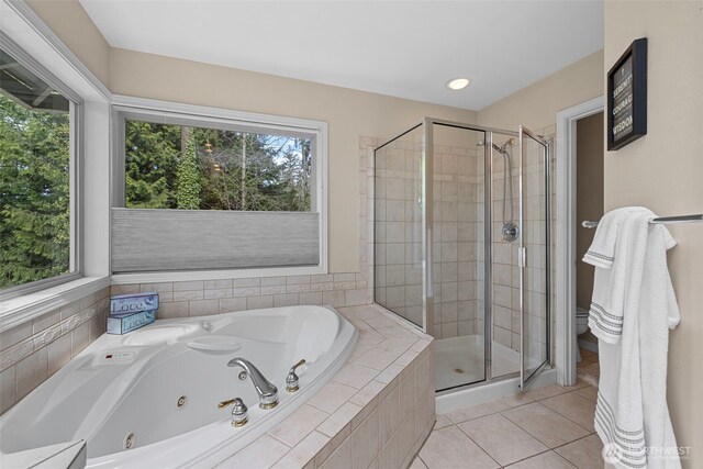 6211 116th Ave NE, Kirkland, WA 98033 - full bath with a shower stall, a jetted tub, and plenty of natural light