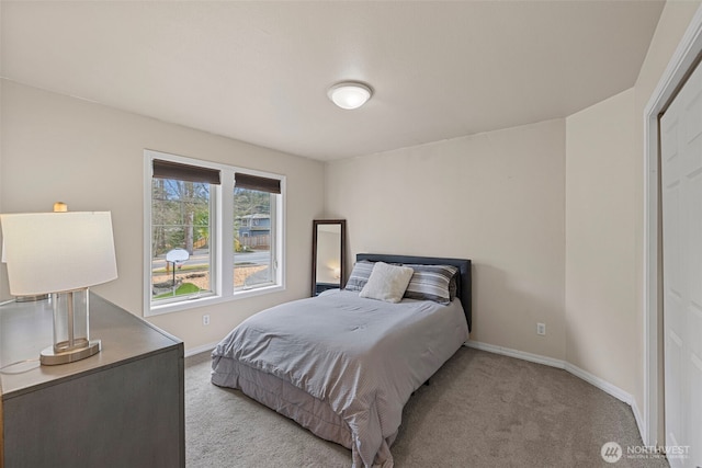 6211 116th Ave NE, Kirkland, WA 98033 - bedroom featuring light colored carpet and baseboards