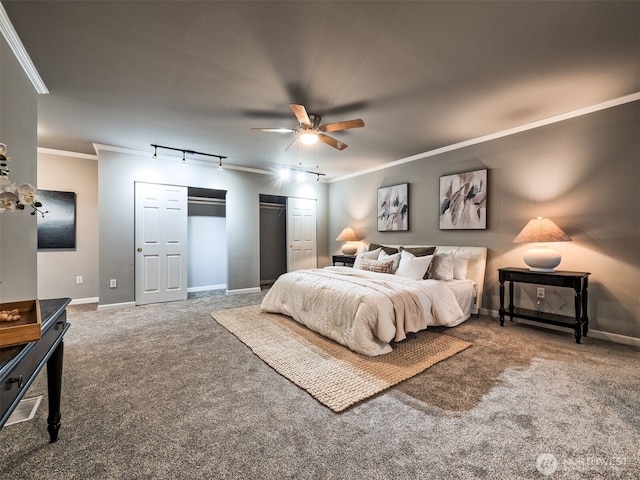 bedroom featuring baseboards, ornamental molding, a ceiling fan, and carpet flooring
