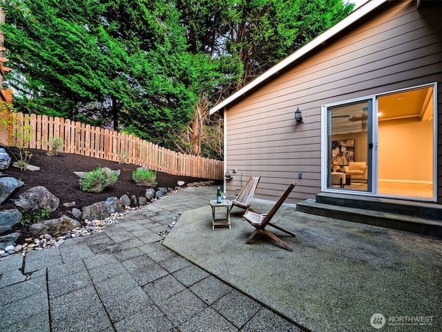view of patio / terrace with fence and entry steps