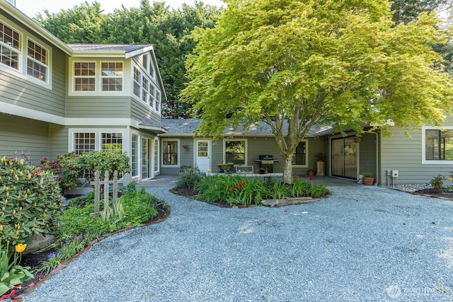 11451 O Ave, Anacortes, WA 98221 - view of front facade featuring a shingled roof and a patio area