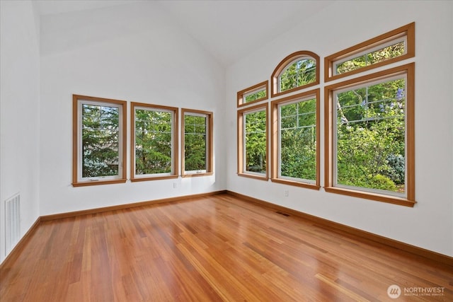 161 E Heron Cv, Shelton, WA 98584 - unfurnished room with plenty of natural light, wood finished floors, and visible vents