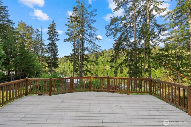 161 E Heron Cv, Shelton, WA 98584 - deck featuring a view of trees