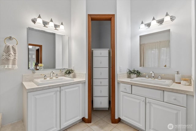 161 E Heron Cv, Shelton, WA 98584 - full bath with a sink, tile patterned floors, and two vanities