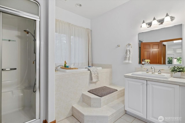 161 E Heron Cv, Shelton, WA 98584 - full bathroom featuring vanity, tile patterned floors, and a stall shower