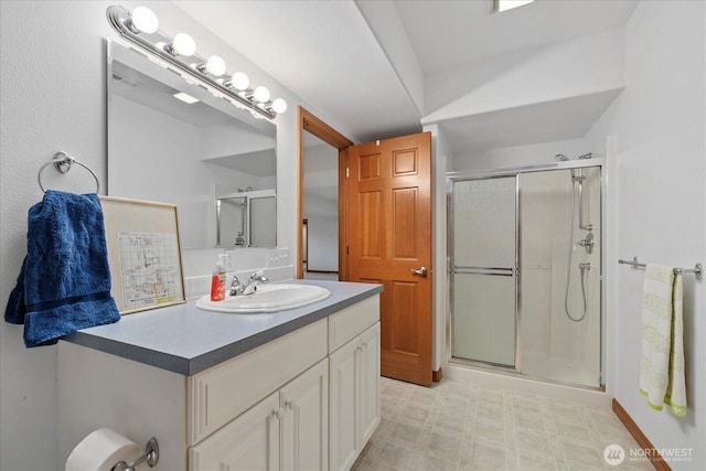 161 E Heron Cv, Shelton, WA 98584 - bathroom with vanity, tile patterned floors, and a shower stall
