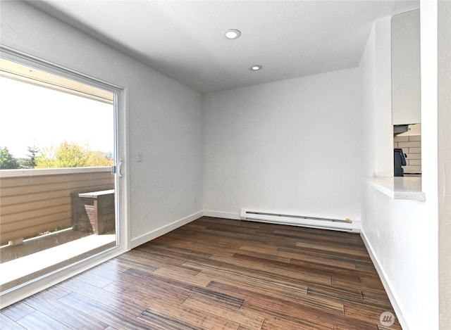 12429 NE 130th Ct Unit G201, Kirkland, WA 98034 - empty room featuring wood finished floors, baseboards, a baseboard heating unit, and recessed lighting