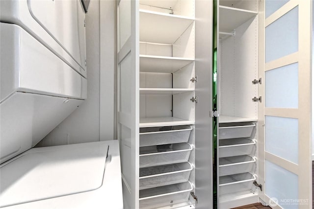 12429 NE 130th Ct Unit G201, Kirkland, WA 98034 - closet featuring stacked washer and clothes dryer