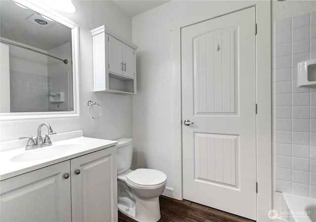 12429 NE 130th Ct Unit G201, Kirkland, WA 98034 - bathroom with toilet, vanity, and wood finished floors