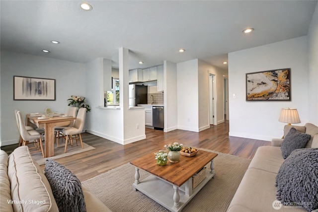 12429 NE 130th Ct Unit G201, Kirkland, WA 98034 - living area with recessed lighting, baseboards, and dark wood finished floors