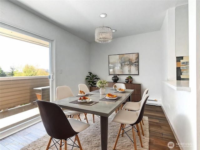 12429 NE 130th Ct Unit G201, Kirkland, WA 98034 - dining space with a baseboard heating unit, an inviting chandelier, recessed lighting, and dark wood-type flooring