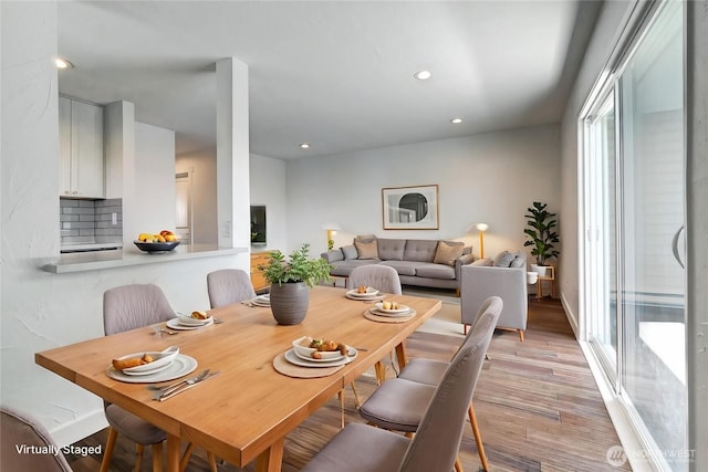 12429 NE 130th Ct Unit G201, Kirkland, WA 98034 - dining space with light wood-style flooring, baseboards, and recessed lighting