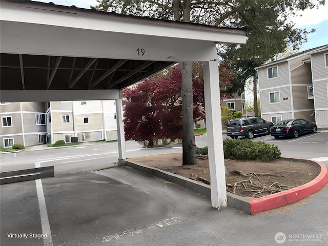 12429 NE 130th Ct Unit G201, Kirkland, WA 98034 - view of partially covered parking lot