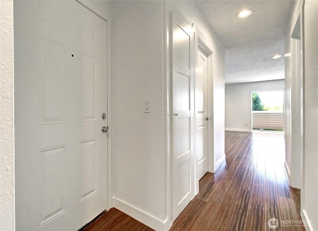 12429 NE 130th Ct Unit G201, Kirkland, WA 98034 - corridor with recessed lighting, baseboards, and dark wood-style floors