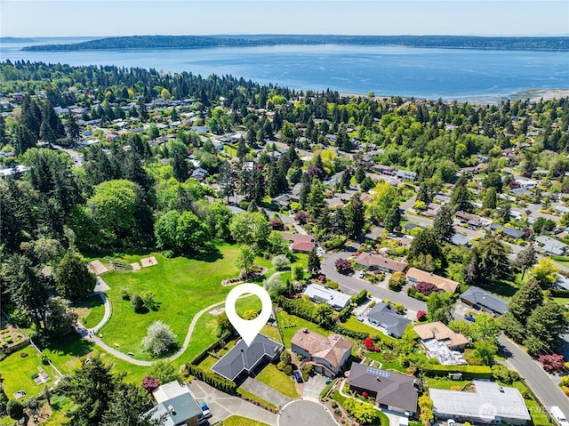 drone / aerial view with a water view