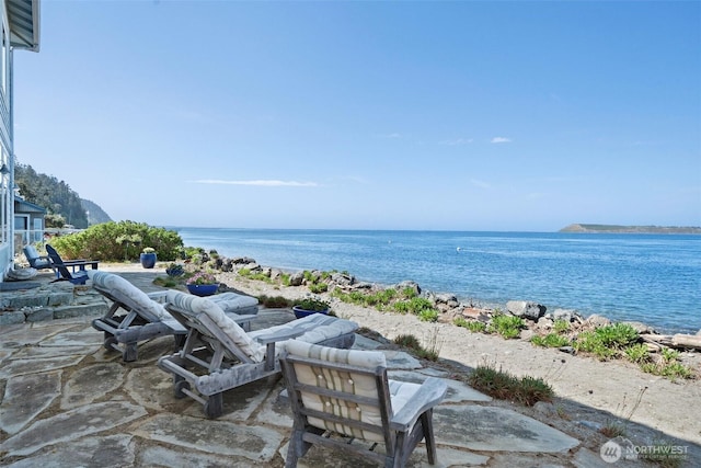 view of patio / terrace featuring a water view