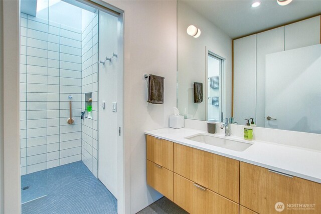 51 Lakshmi Rd, Orcas Island, WA 98245 - bathroom featuring vanity, a tile shower, and recessed lighting