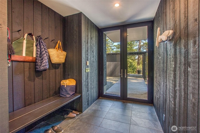 51 Lakshmi Rd, Orcas Island, WA 98245 - mudroom featuring french doors, wood walls, and tile patterned flooring