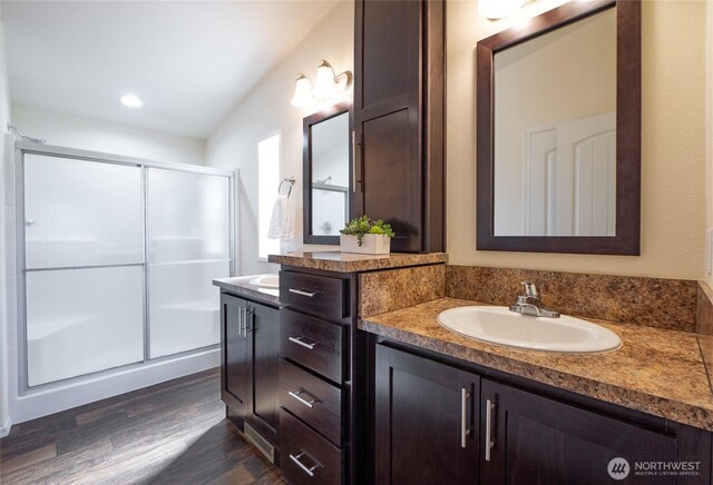 4739 Alderson Rd, Blaine, WA 98230 - full bath with a shower stall, wood finished floors, vanity, and recessed lighting