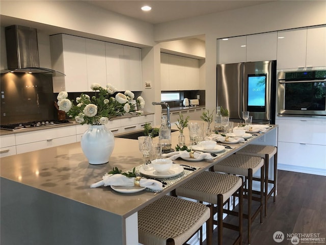 dining room with recessed lighting and dark wood-style flooring