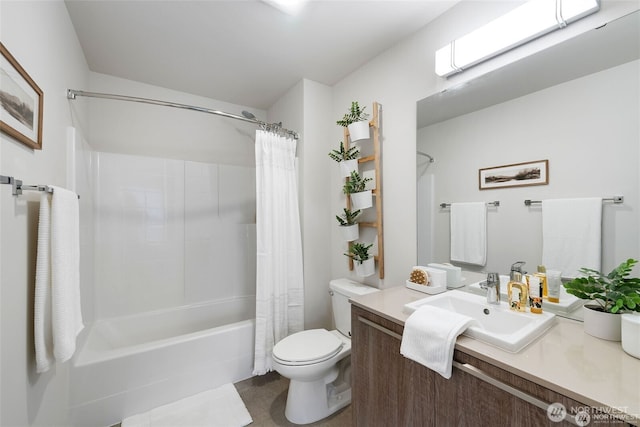 full bathroom featuring vanity, toilet, and shower / bath combination with curtain