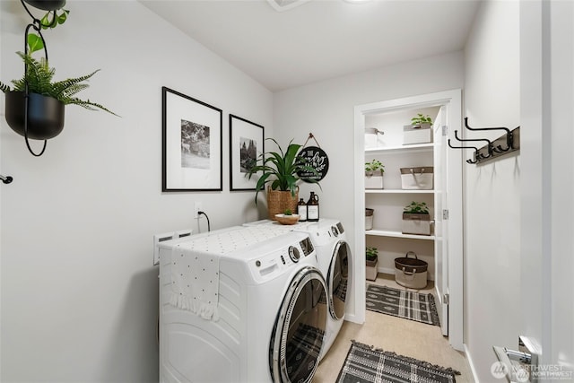 laundry area with laundry area and independent washer and dryer