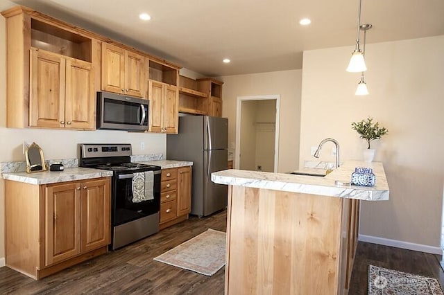 kitchen featuring appliances with stainless steel finishes, open shelves, a sink, dark wood-style floors, and a peninsula