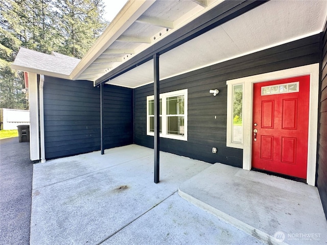 entrance to property featuring a patio area