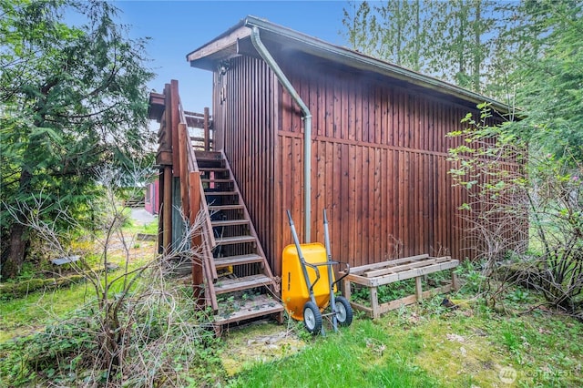 view of outdoor structure with stairway