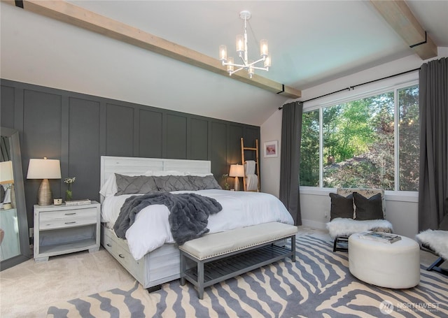 bedroom featuring light carpet, a decorative wall, lofted ceiling with beams, and a notable chandelier