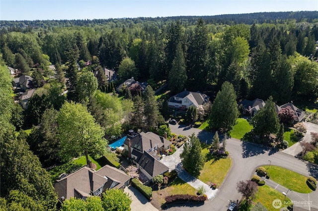 12938 196th Ct NE, Woodinville, WA 98077 - aerial view of residential area featuring a heavily wooded area