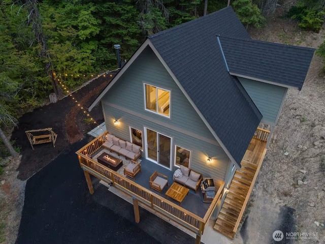 41 Hawkeye, Ronald, WA 98940 - back of house featuring a deck, a view of trees, an outdoor hangout area, roof with shingles, and stairs