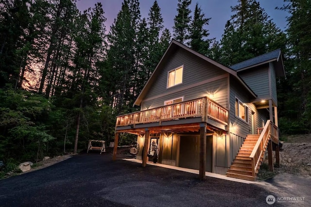 41 Hawkeye, Ronald, WA 98940 - view of front of home with a garage, stairway, and a wooden deck