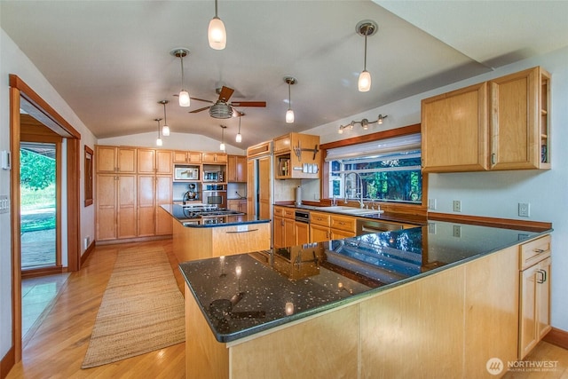 97 Snowberry Ln, Orcas Island, WA 98245 - kitchen with built in appliances, a center island, lofted ceiling, light wood-style flooring, and ceiling fan
