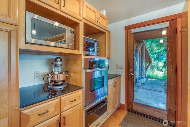 97 Snowberry Ln, Orcas Island, WA 98245 - kitchen featuring stainless steel appliances, a warming drawer, and light wood finished floors
