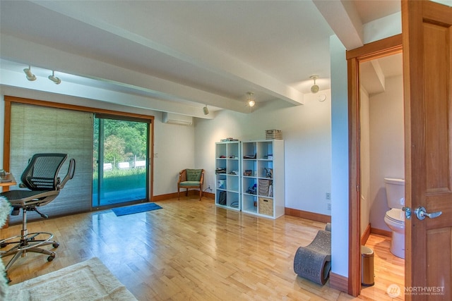 97 Snowberry Ln, Orcas Island, WA 98245 - office area with light wood-style flooring and a wall mounted AC