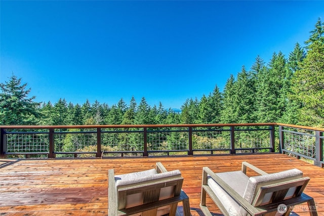 97 Snowberry Ln, Orcas Island, WA 98245 - deck featuring a forest view