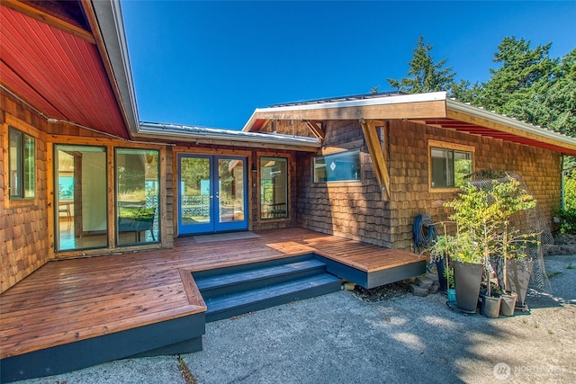 97 Snowberry Ln, Orcas Island, WA 98245 - property entrance with a wooden deck and french doors