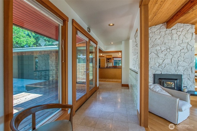 97 Snowberry Ln, Orcas Island, WA 98245 - hall featuring beamed ceiling, tile patterned flooring, french doors, and recessed lighting