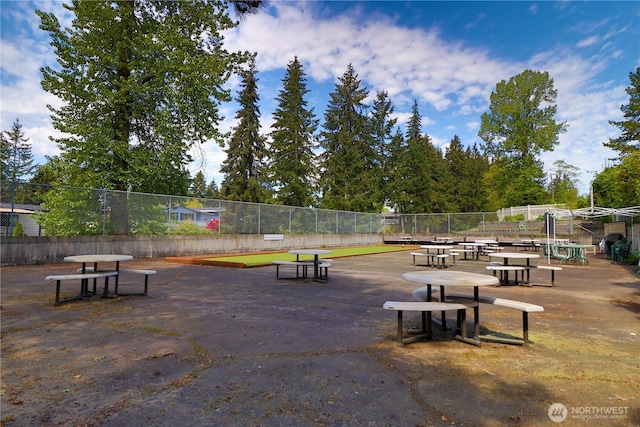 view of property's community with fence